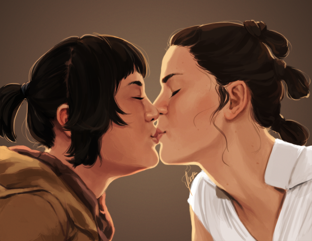 Rey and Rose Tico sharing a kiss.
