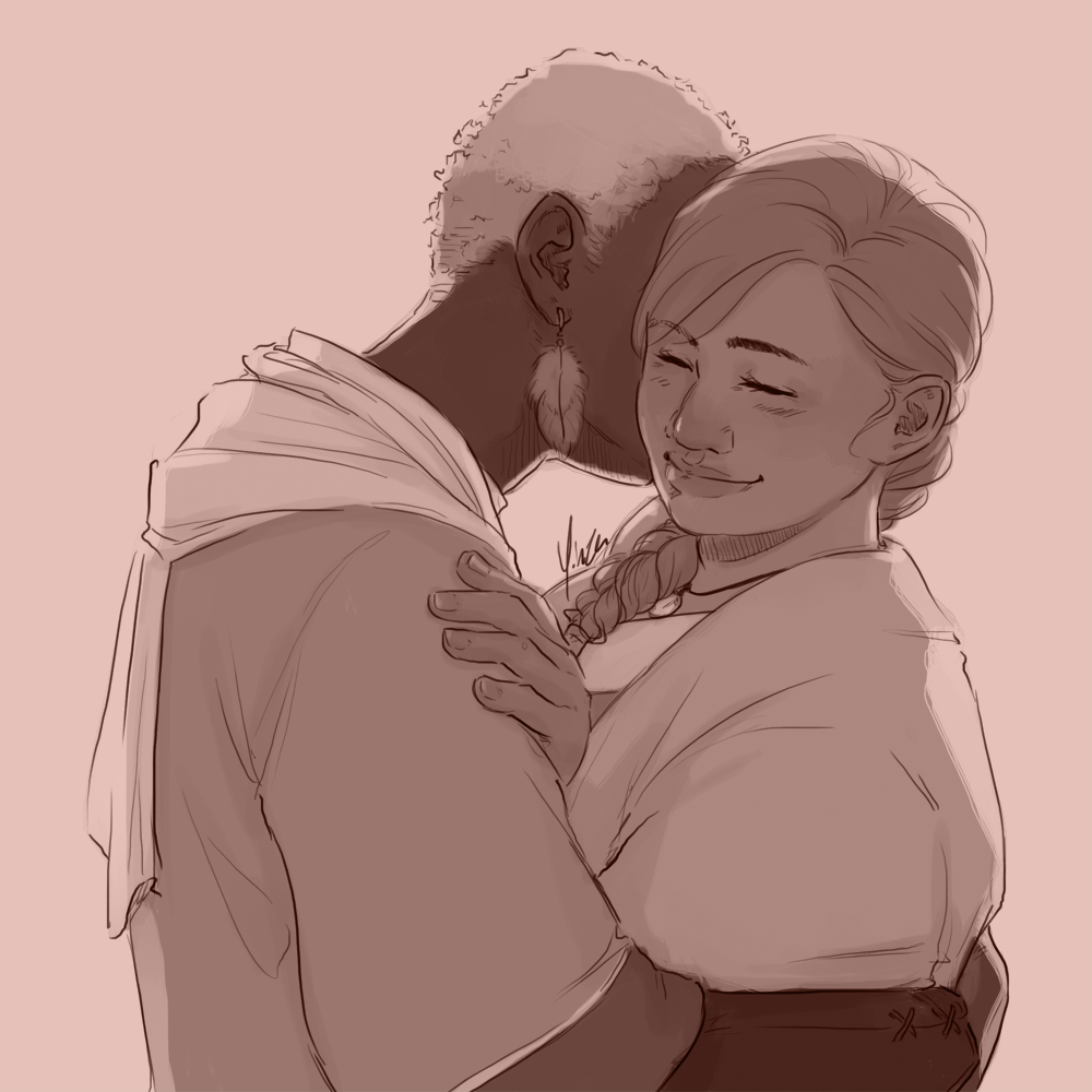 A man leans in to kiss his wife on the cheek.