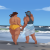 thumbnail image: a couple walking on the beach